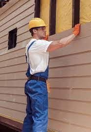 How To Choose The Right Materials for Your Siding Installation in 'Rafter J Ranch, WY